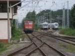 Whrend 115 448,am 27.August 2011,in Binz an den EC 379 nach Brno fuhr,stand der Leerpark fr IC 2213 nach Stuttgart schon bereit an den Bahnsteig zufahren,ebenfalls stand,am 27.August 2011,der ICE