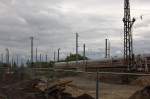 Blick auf das nordwestliche Bahnhofsvorfeld von Radebeul West ,auch hier sind die Bauarbeiten fr die Neutrassierung der S-Bahn Dresden - Meien zu erkennen. Um 14:47 passiert gerade ein ICE den Baustellenbereich. 18.05.2013