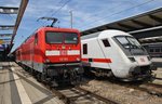 Treffen im Rostocker Hauptbahnhof von 112 103 mit RE5 (RE4356) aus Wünsdorf-Waldstadt und dem IC2212 von Koblenz Hauptbahnhof nach Ostseebad Binz mit 101 060-2. (20.8.2016)