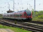 Einfahrt eines Flirt aus Blankenberg im Bahnhof von Rostock HBF am 01.05.2012