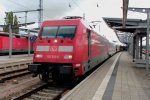 Die 101 011-5 fhrt am 27.09.2013 mit dem IC 2238 nach Warnemnde, hier beim Halt in Rostock Hbf.