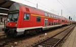 RE18491  Warnemünde-Express  von Warnemünde nach Berlin Lichtenberg verlässt am Abend des 4.9.2016, geführt von 112 118 den Rostocker Hauptbahnhof.