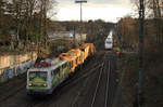 Am 03.02.2021 zog Sunail 140 002 einen Plasser&Theurer Buzug richtung Wuppertal durch Solingen-Ohilgs.