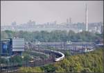 Bahn und Stadtlandschaft -     Blick vom Bahnhofsturm auf das Vorfeld des Stuttgarter Hauptbahnhofes mit dem Abstellbahnhof am Rosensteinpark.