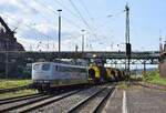 151 165 von Saar Rail fährt mit einem Torpedowagenzug in Völklingen ein. Geladen hat der Zug Flüssigstahl zur Weiterverarbeitung. 

Völklingen 30.09.2024