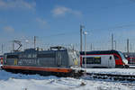 162.004  Fitzcarraldo  wartet im Februar 2021 am Hauptbahnhof Wanne-Eickel auf die Durchfahrt von Abellio 3427 511.