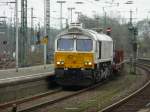 247 011 an der Spitze des allnachmittglichen mit Bandstahl beladenen Gterzugs bei der Durchfahrt durch Wanne-Eickel Hbf. (01.04.2011)