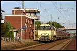 Die WLE 21 Warsteiner Werbelok kommt hier am 18.9.2005 mit einem Müller Partyzug in Richtung Münster durch den Bahnhof Hasbergen.