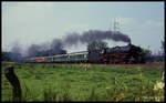 011066 ist hier am 21.7.1990 mit einem Sonderzug nach Osnabrück auf der eingleisigen Strecke bei Lotte - Halen unterwegs.