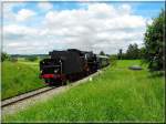 01 066 befindet sich mit ihrem Pfingstsonderzug auf den Rckweg von Feuchtwangen nach Nrdlingen.(bei Feuchtwangen,30.05.2009)