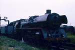 An einem trben Tag im Frhjahr 1976 hlt 03 0010-3 mit D 552 von Berlin-Lichtenberg nach Stralsund zum Wasserfassen in Angemnde.