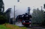 03 1010 mit Sonderzug nach Berlin im strmenden Regen am 30.07.2011 nach berquerung des Mittellandkanals bei Peine