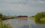 Die 03 1010 fuhr am 16.06.2012 mit einem Sonderzug von Emden ber eine Kanalbrcke bei Neermoor.