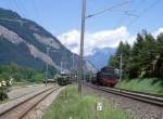 RhB/SBB Dampfzug-Prarallelfahrt jeweils Tender vorraus RhB 3853/33049 SBB mit den Dampflokomotiven RhB G 4/5 107 / SBB (ex DB) 23 058 von Landquart nach Chur vom 08.06.1997 bei Haldenstein  