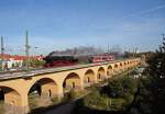 Auf dem Wahrener Viadukt in Leipzig begegnen sich am 09.10.2009 die 52 8154-8 des Eisenbahnmuseums Bayerischer Bahnhof zu Leipzig(EMBB)und RB 16372 aus Gera kommend, mit Fahrtziel Leipzig Hbf.