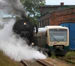 52 8079+112 565-7(hinten)als PRE81259 von Bergen auf Rgen nach Lauterbach Mole bei der Ausfahrt im Bahnhof Bergen auf Rgen.14.06.2014 