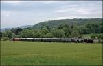 Von einer Anhhe bei Hemer wird der Dampfzug, der Hammer Eisenbahnfreunde, mit der V60 615 als Zuglok und der 80 039 am Zugschluss Bildlich vor typisch Sauerlndischer Landschaft festgehalten.