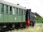 Die 111-jhrige Dampflok BR 91 134 -DR- fhrte nach zehnjhriger Pause einen Sonderzug auf der Strecke von Schwerin ber gadebusch nach Rehna. Hier wartet BR 91 134 am bahnsteig 1 im Bahnhof Rehna (NWM) auf die Rckfahrt nach Schwerin. Der Lokfhrer ttigt noch die letzten Handgriffe 26.07.2009