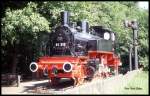 Zwei Dampflokomotiven der Georgs Marien Hütten Eisenbahn haben überlebt! Als Denkmal wurde die letzte Streckenlok der GME, Lok 5, in Münster Gremmendorf aufgestellt. MIt der Nummer 91318 steht sie heute noch immer sinnbildlich für den  Pingel Anton . Die Aufnahme entstand am9.7.1993.