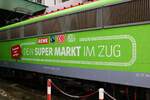 Aufschrift an GfF 110 292-0 mit dem REWE Supermarktzug in Darmstadt Hbf am 04.12.21