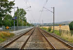 Mit dem Fahrrad von Kassel nach Halle (Saale) | Tag 4 Berga-Kelbra–Riestedt  Strecken-km: 71,6    Die Streckengleise Richtung Berga-Kelbra am modernen Bahnsteig 2 in Bennungen.