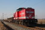 Diese V100 des EVU Uwe Adam war am 04.03.2011 mit einem Arbeitszug auf der S-Bahn Strecke Leipzig-Halle unterwegs, hier aufgenommen in Schkeuditz-West.