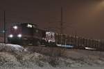 202 264 der WFL bringt beladene Holzwagen vom Stralsunder Sdhafen zum Bf Stralsund Rgendamm am 16.02.2010