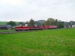 112 565-7 (PRESS), 202 646-6 (Erzgebirgsbahn), 112 708-3 (RIS) und 218 430-7 kommen am 02.10.10 vom Brckenfest in Markersbach, hier in Raschau.