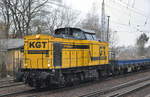 KGT Gleis- und Tiefbau GmbH, Berlin mit  203 737  [NVR-Nummer: 92 80 1203 136-7 D-KGT] und einigen Drehgestell-Flachwagen mit Sand beladen am 04.03.21 Berlin Hirschgarten.