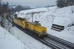 203 314-0 mit dem 711 116-4 in Fahrtrichtung Sden bei Cornberg. Aufgenommen am 04.02.2010.