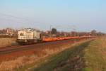 Mit nagelneuen Taschenwagen von TXL ist diese  oak-capital.de  V100 bei Zeithain in Richtung Falkenberg unterwegs. 02.03.14