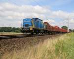 203 103-7 (V1702) der MWB/EVB mit Holzzug in Fahrtrichtung Süden. Aufgenommen am 22.07.2014 bei Eystrup.