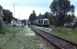 Mit einem der wenigen damals noch existierenden GmP fährt 211 309-0 auf dem Weg von Beilgries nach Neumarkt im Juli 1985 in den Bahnhof Berching ein.