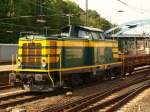 211 074 von der Erfurter Gleisbau Gmbh mit Bauwagen bei der Fahrt durch den Aachener Hbf am 12.07.2010