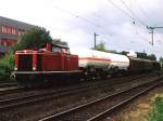 Die Emsland II der Emslndische Eisenbahn GmbH mit bergabegterzug 56456 Sedelsberg-Ocholt in Ocholt am 19-8-2004. Bild und scan: Date Jan de Vries. 