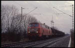 DB 218459 mit Güterzug bei Tornesch am 1.4.1994 um 9.25 Uhr in Fahrtrichtung Kiel.