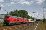 IC Richtung Westerland am 30.05.2009 mit 218 369-7 und 218 xxx-x durchfhrt den Bf. Tornesch.