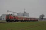 Die 218 360-6 fuhr am 14.02.2011 durch Kuchenheim, im Hintergrund ist die Zuckerfabrik, nahe Euskirchen.