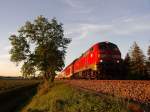 218 427-3 mit IRE 4235 von Stuttgart nach Lindau am 08.05.2011 kurz nach der Abfahrt in Meckenbeuren.