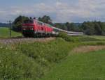 Kurz nach dem Gleiswechsel von der KBS 970 auf die KBS 753 und dem Passsieren des Bahnhofs von Hergatz befinden sich 218 421-6 und 218 454-7 mit dem EC 195 von Zrich am 15.06.2014 auf der Fahrt nach
