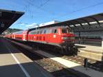 218 409 im Juli 2017 mit einem Ire nach Lindau Hbf in Ulm Hbf.