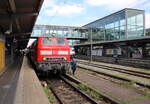 DB 218 403-4 mit dem RE 4865 von Hof Hbf nach München Hbf, am 14.07.2024 in Regensburg Hbf.