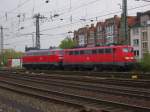 Die 110 210-2 und 218 838-1 standen am 08.05.2010 in Aachen Hbf abgestellt um danach nach Kln ber Herzogenrath weiter zu fahren.