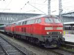 218 433-1 & 218 444-8 mit einem EC am Haken am 04.04.2010 in München Hbf. 