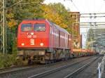 DE13 der HGK kommt mit den letzten Sonnenstrahlen ber die Klner Sdbrcke am 28.10.2010