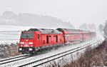 245 035 ist in einem Schneesturm mit einem Re aus Ulm nach Friedrichshafen in Watenweiler unterwegs.Bild 5.1.2019