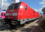 245 014 steht am 27. September 2014 auf der InnoTrans in Berlin ausgestellt. Dahinter steht 187 009.