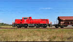 261 084-8 (Voith Gravita 10 BB) wird dem Bahnhof Röblingen am See zwei Schwenkdachwagen mit der Bezeichnung  Tads-z  übergeben und konnte bei Eisdorf (Teutschenthal) seitlich festgehalten