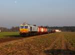 Die 247 055 mit einem Güterzug am 14.03.2014 unterwegs bei Altötting.