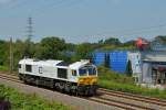 Euro Cargo Rail 247 039-1 am 31.07.2014 in Oberhausen. Das Gebäude im Hintergrund mit dem auf das Dach montierten Helikopter gehört zum Spionagemuseum  Top Secret . Aufnaheposition war die oberste Ebene des Parkhauses P3 des CentrO Oberhausen.